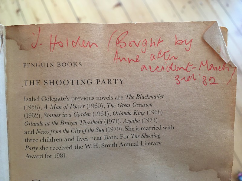 Title page of 'The Shooting Party' by Isabel Colegate with details of her other books and a handwritten message in red ink which says 'J Holden (Bought by Anne after accident - 3rd March '82)'
